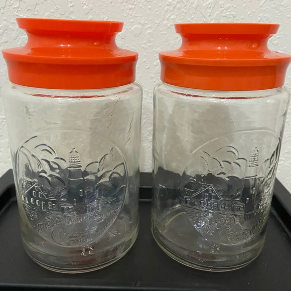 Set of 2 Anchor Hocking Glass Tang Jar Orange Lid Lighthouse Storage Canister - Picture 1 of 12